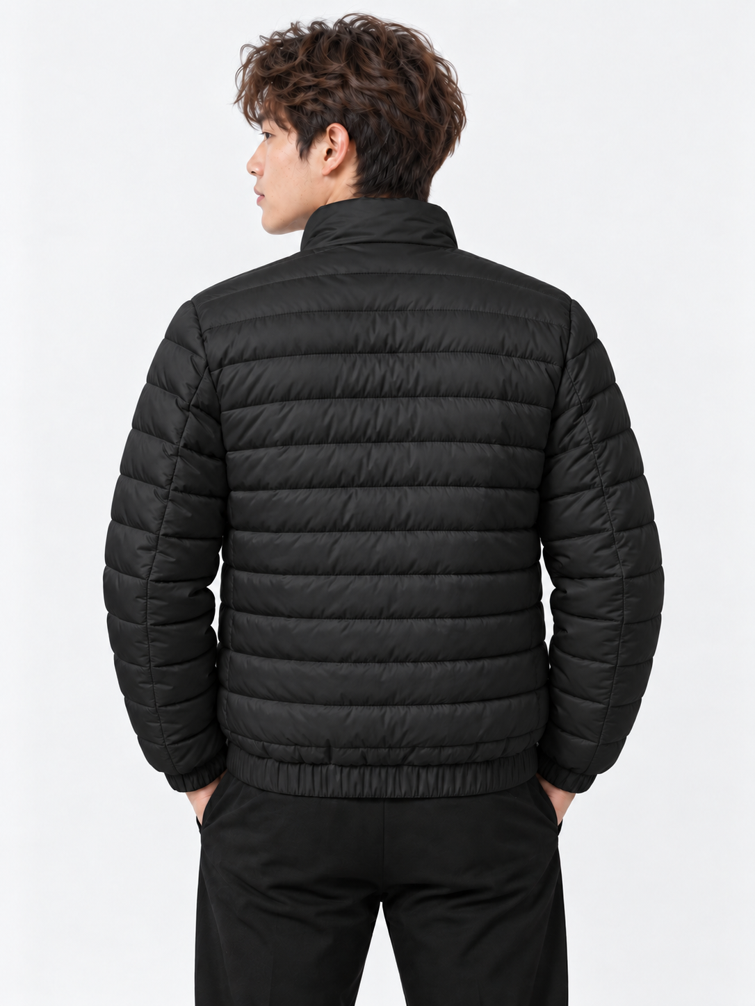 Black quilted puffer back view